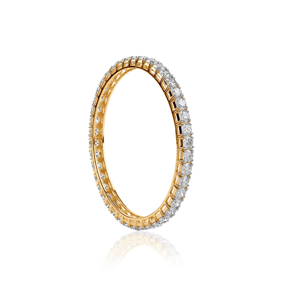 Gold eternity band with diamond-encrusted sides, elegantly reflecting light