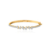 Gold bracelet with alternating diamond clusters and pear-shaped stones