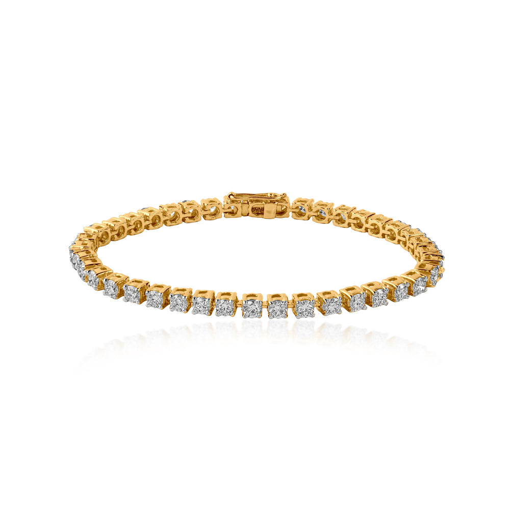 Gold tennis bracelet with sparkling diamond stones in classic design