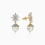 Gold and diamond star earrings with white pearl drops, intricate floral design