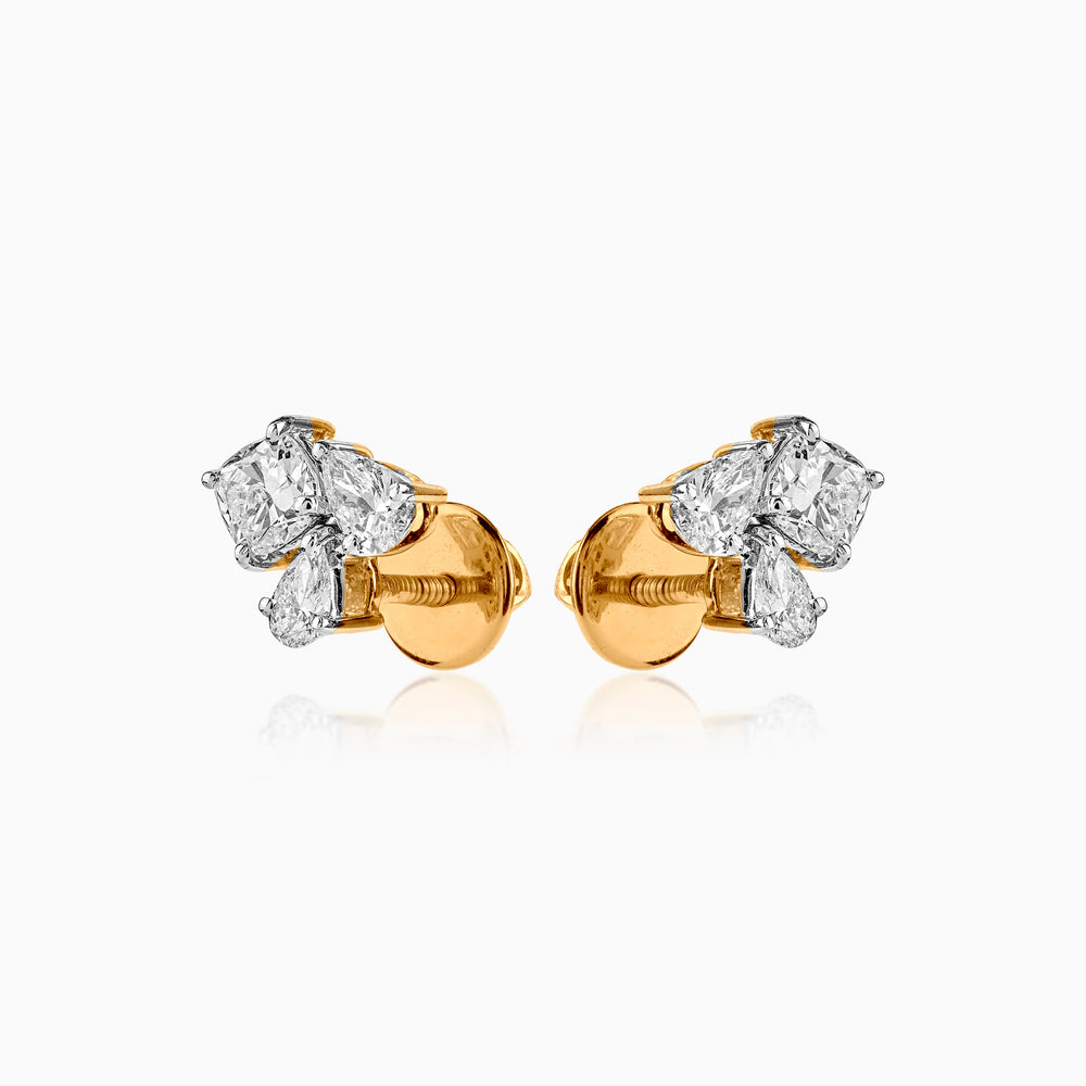 Gold and diamond cluster stud earrings with multiple diamond shapes and screw-back closure