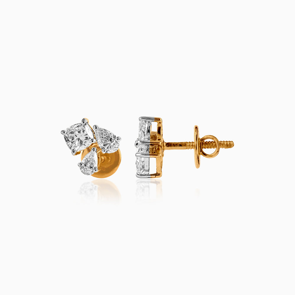 Gold and diamond stud earrings with multiple diamond shapes, showing front and side view