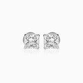 Princess-cut diamond stud earrings in silver, sparkling against white background