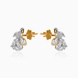Diamond cluster earrings in gold and white gold with pear-shaped stones and screw-back posts