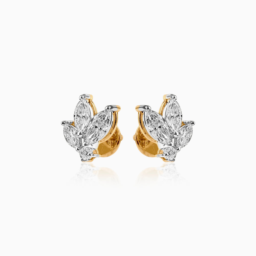 Gold and silver diamond cluster earrings with marquise and round stones