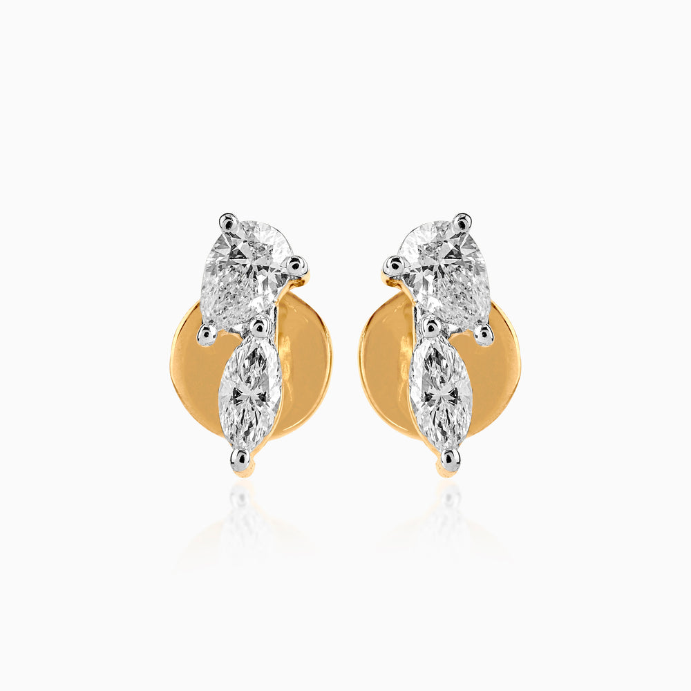 Gold and silver diamond stud earrings with multiple cut stones and curved design