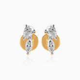 Gold and silver diamond stud earrings with multiple cut stones and curved design