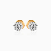 Gold stud earrings with round brilliant diamond solitaires in prong settings