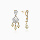 Diamond and pearl chandelier earrings in gold with pear-cut stones and hanging pearl drops