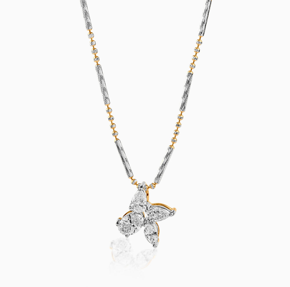 Diamond butterfly pendant on two-tone metallic chain with silver and gold accents