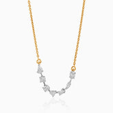 Gold chain with multi-cut diamond pendant, featuring unique geometric diamond shapes.