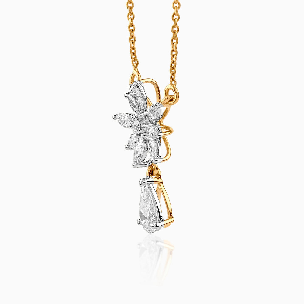 Gold chain with diamond butterfly pendant in white and yellow gold tones