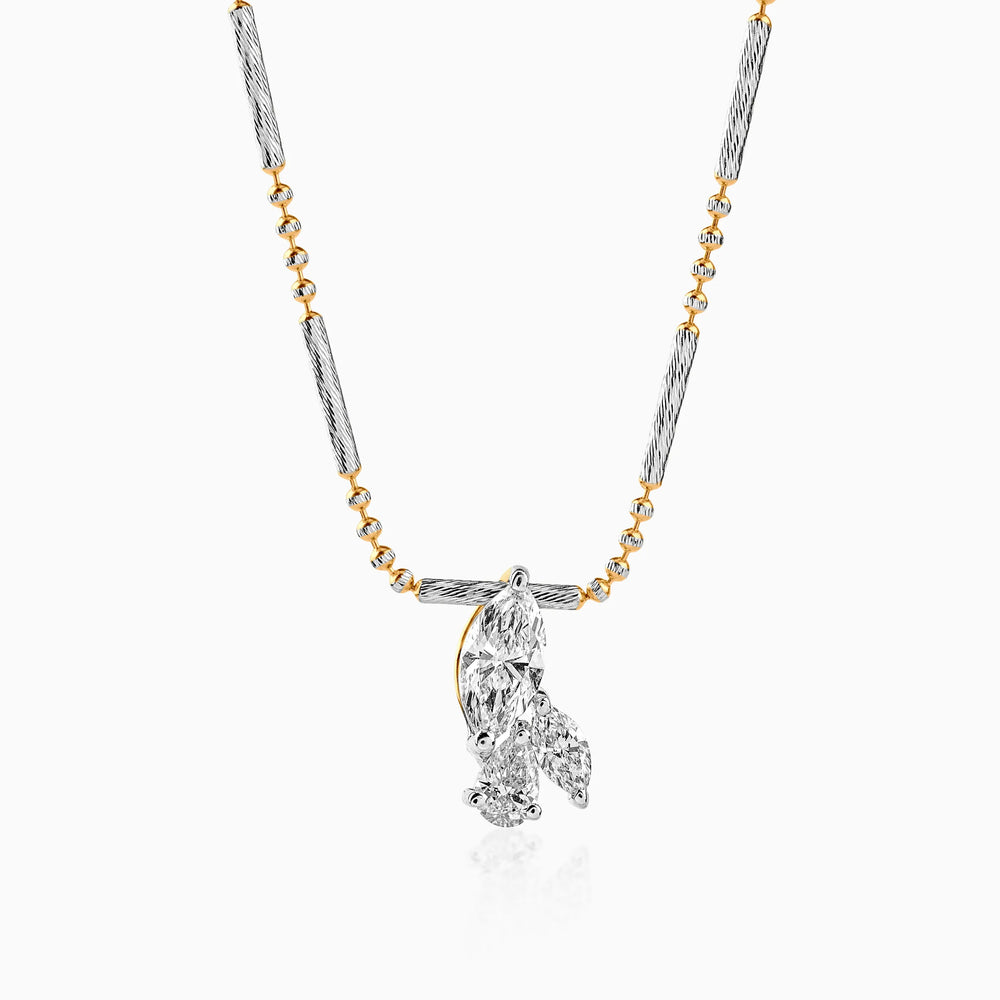 Two-tone diamond pendant necklace with twisted silver and gold chain