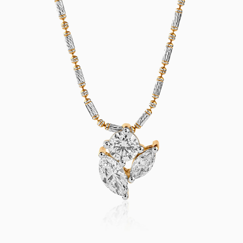 Diamond pendant with mixed metal chain, clusters of white and gold gems