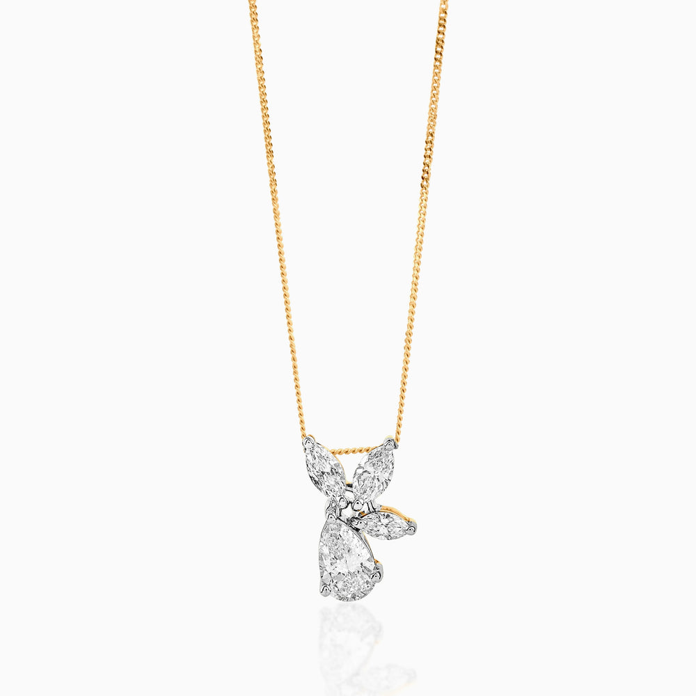 Diamond butterfly pendant on gold chain with delicate marquise and teardrop stones