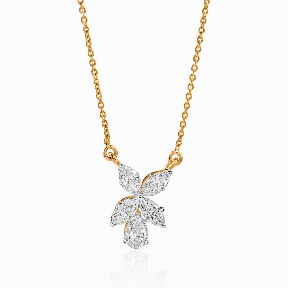 Gold necklace with diamond flower pendant, marquise and pear-cut stones in delicate cluster design