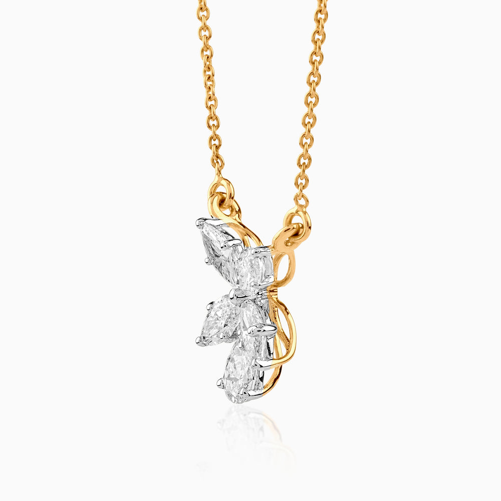 Diamond butterfly pendant on gold chain, white gemstones form delicate wings