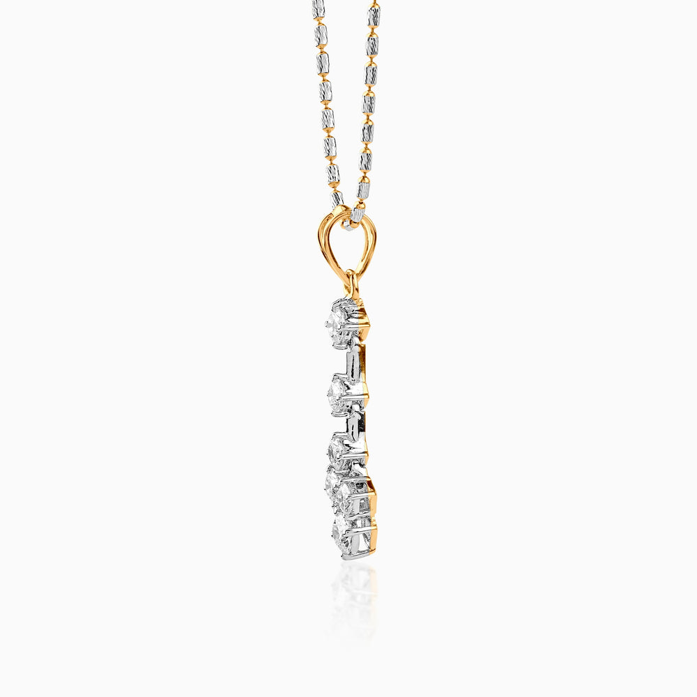 Gold and silver diamond pendant on delicate two-tone chain, vertical linear design