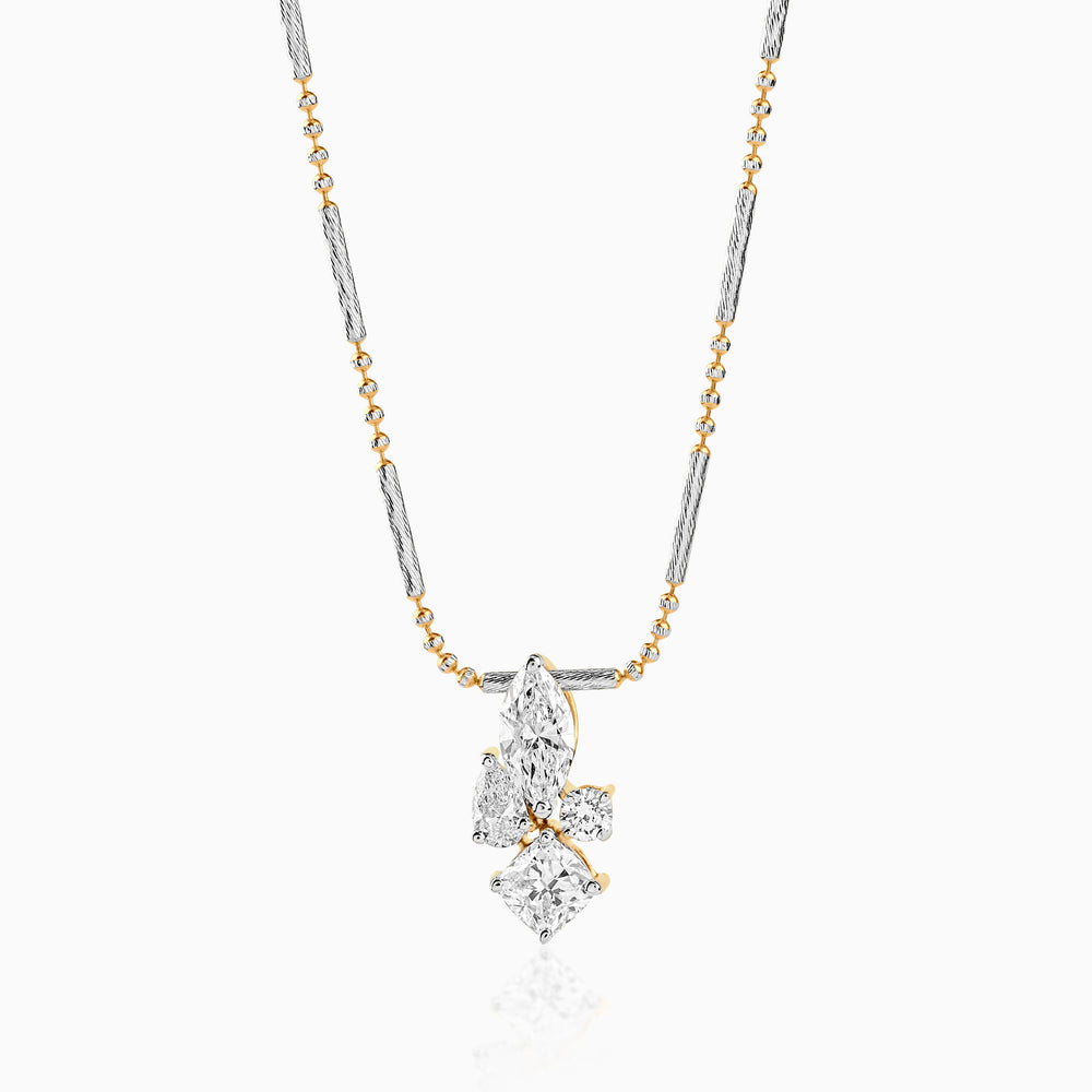 Two-tone necklace with multi-cut diamond pendant on mixed metal chain with gold and silver tones.