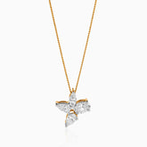 Gold chain with diamond butterfly pendant, white and yellow gold accent