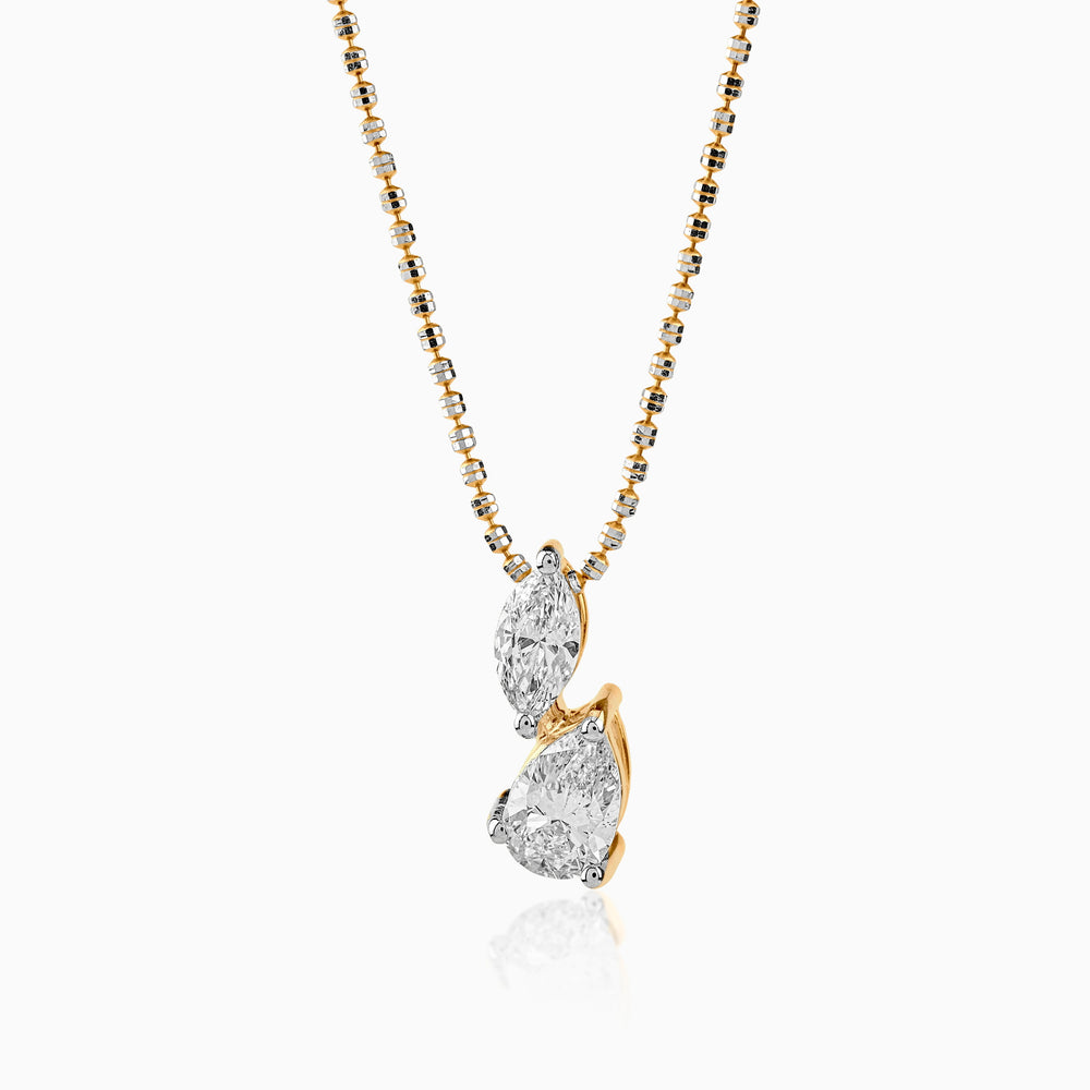 Gold and silver chain with two-stone diamond pendant in marquise and pear cuts