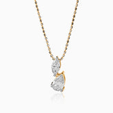 Gold and silver chain with two-stone diamond pendant in marquise and pear cuts