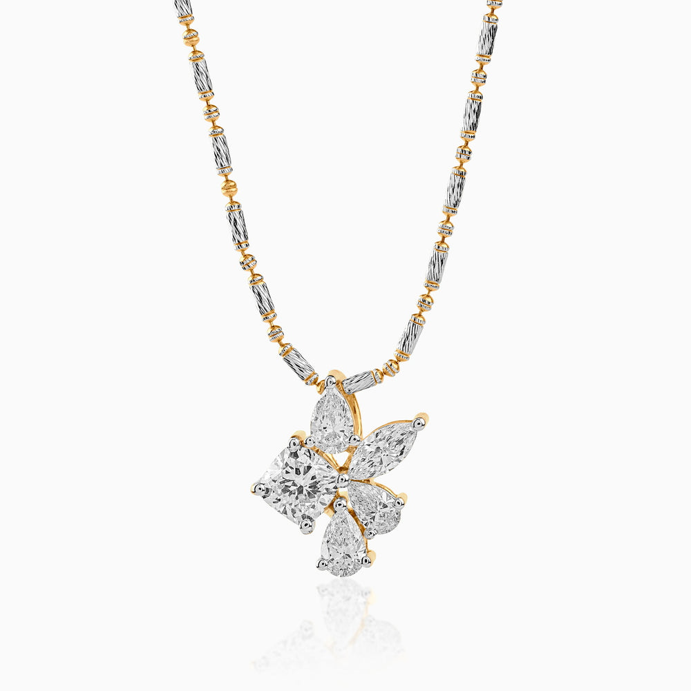 Diamond butterfly pendant on two-tone metallic chain with gold and silver links