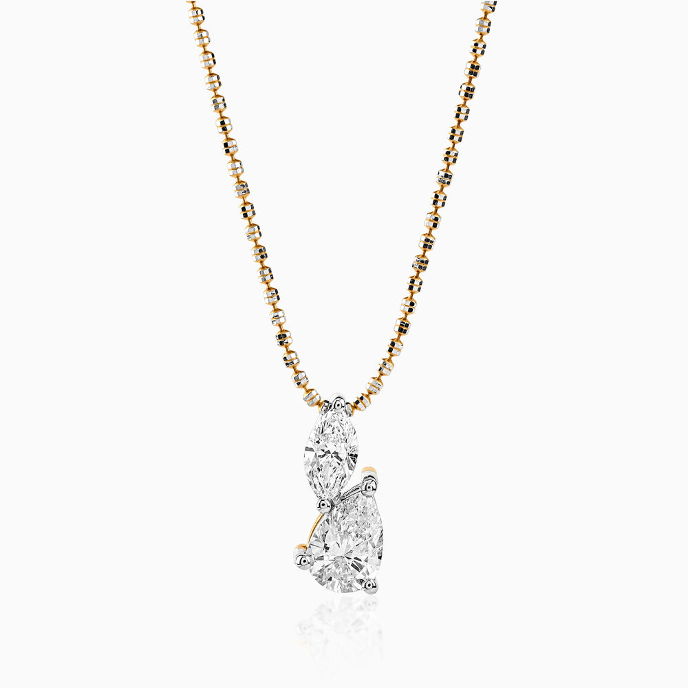 Gold chain with two-stone diamond pendant in pear and marquise cuts