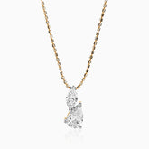 Gold chain with two-stone diamond pendant in pear and marquise cuts