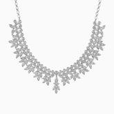 Intricate diamond leaf necklace with cascading floral design in silver and white tones