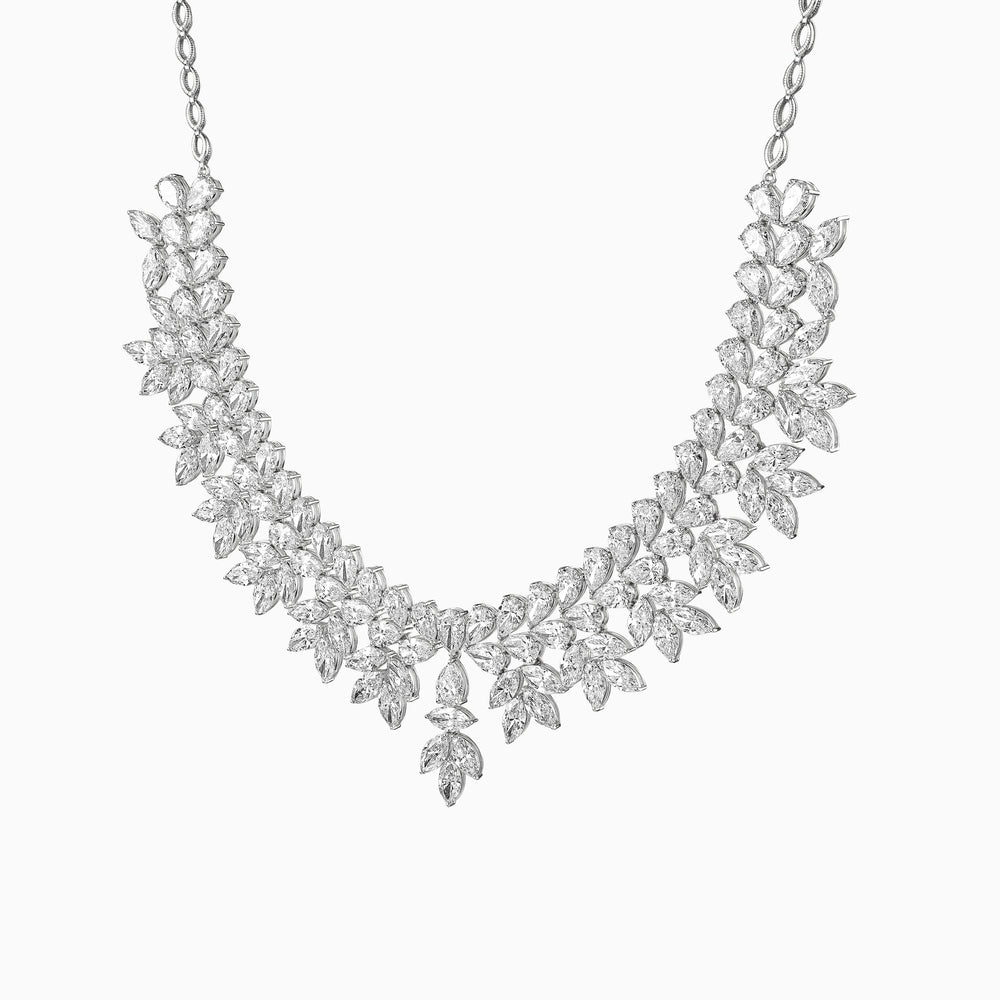 Elaborate diamond necklace with leaf-shaped clusters and delicate chain
