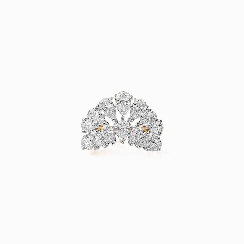 Diamond earring with pear-shaped stones in fan-like cluster design, silver and gold tones