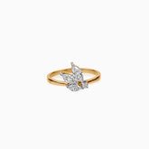 Gold ring with butterfly-shaped diamond cluster on white background