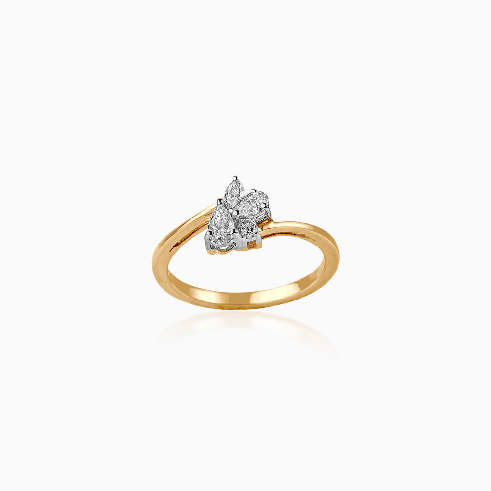 Gold ring with clustered white diamond stones in unique asymmetrical setting