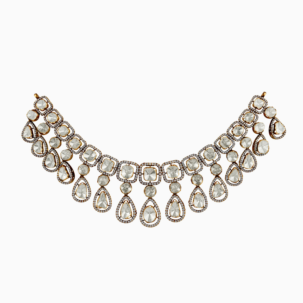 Vintage-style diamond and gold statement necklace with teardrop and square gems