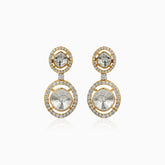 Gold drop earrings with diamond-encrusted circles and gray center stones