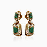 Emerald and diamond statement earrings in ornate gold setting