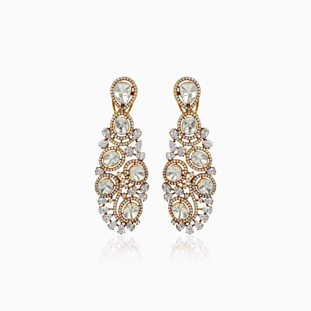 Ornate gold chandelier earrings with diamond-like stones in cascading circular design