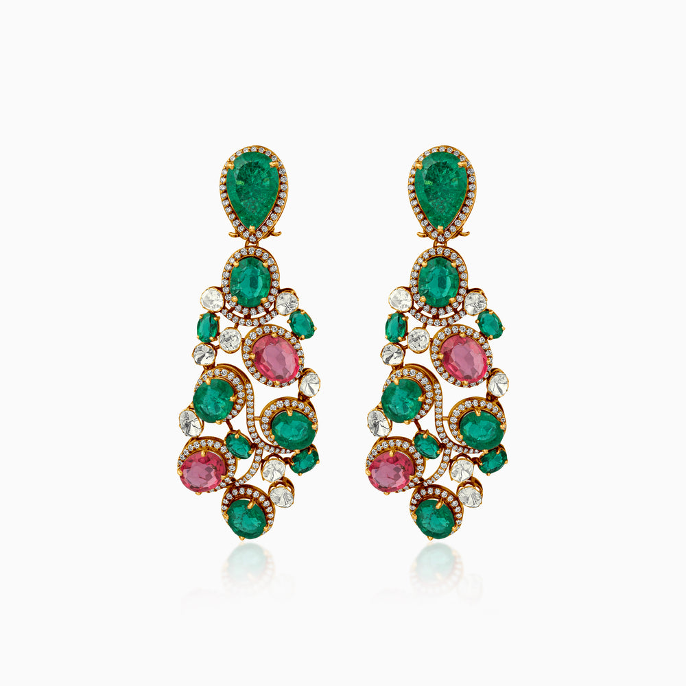 Ornate emerald and ruby chandelier earrings with diamond accents in gold setting