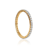 Gold eternity band with diamond-encrusted sides, elegantly reflecting light