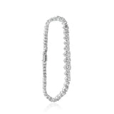 Sparkling diamond tennis bracelet in white gold with intricate round brilliant stones