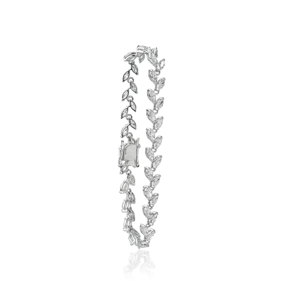 Silver leaf-shaped diamond bracelet with delicate, interlinked geometric design