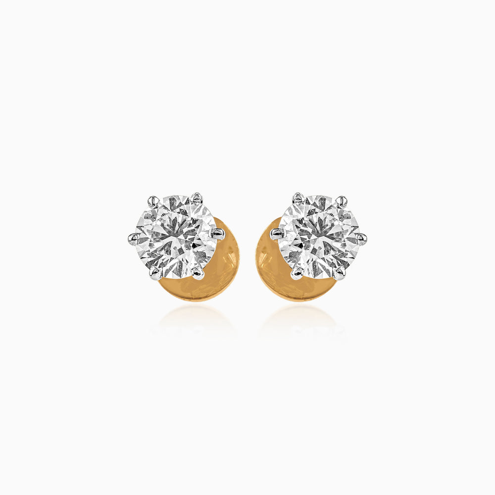 Diamond stud earrings with gold backing, sparkling round brilliant cut stones