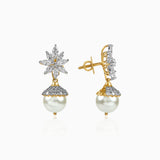 Gold and diamond star earrings with white pearl drops, intricate floral design