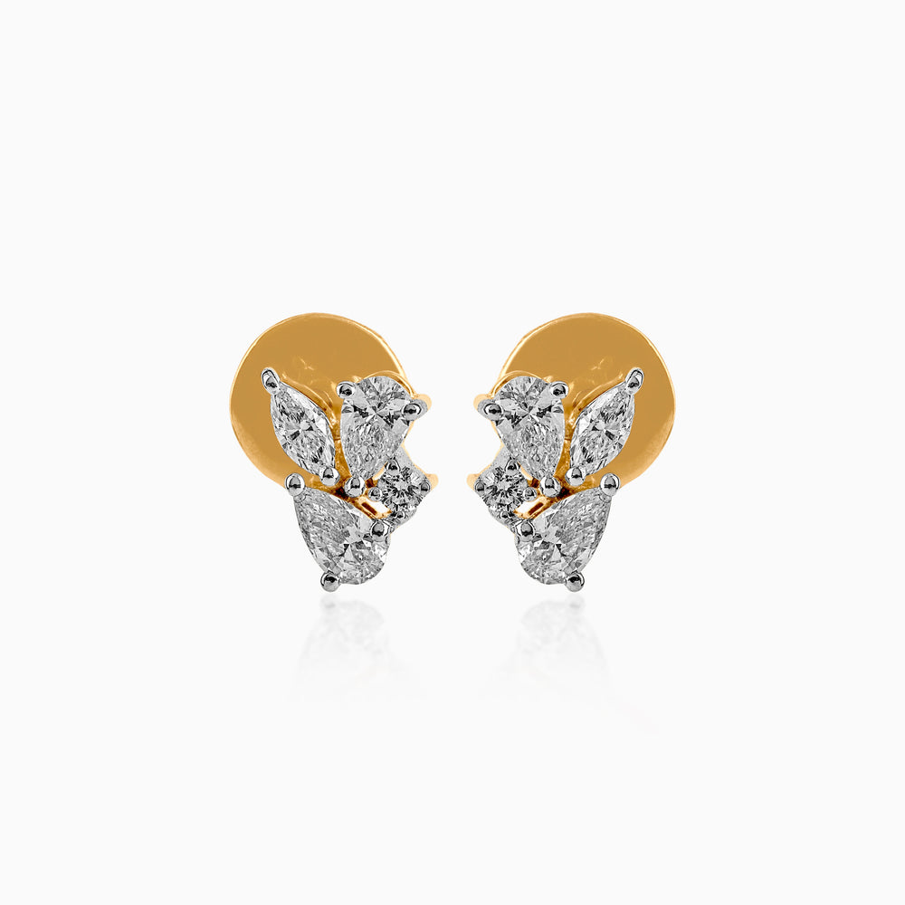 Gold and diamond cluster stud earrings with mixed-cut stones in elegant design