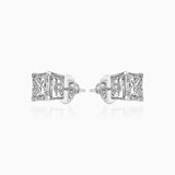 Sparkling diamond stud earrings in white gold with intricate side detailing