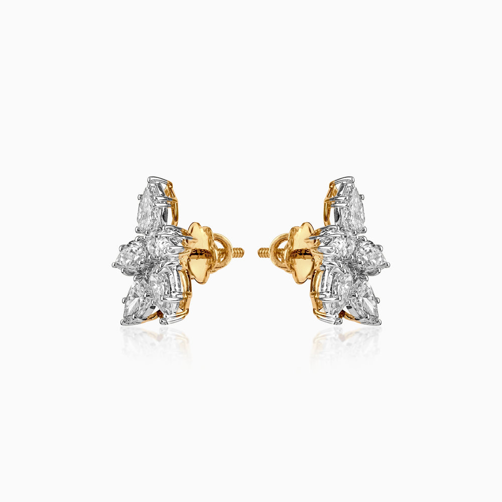 Gold and silver diamond cluster stud earrings with intricate multi-stone design