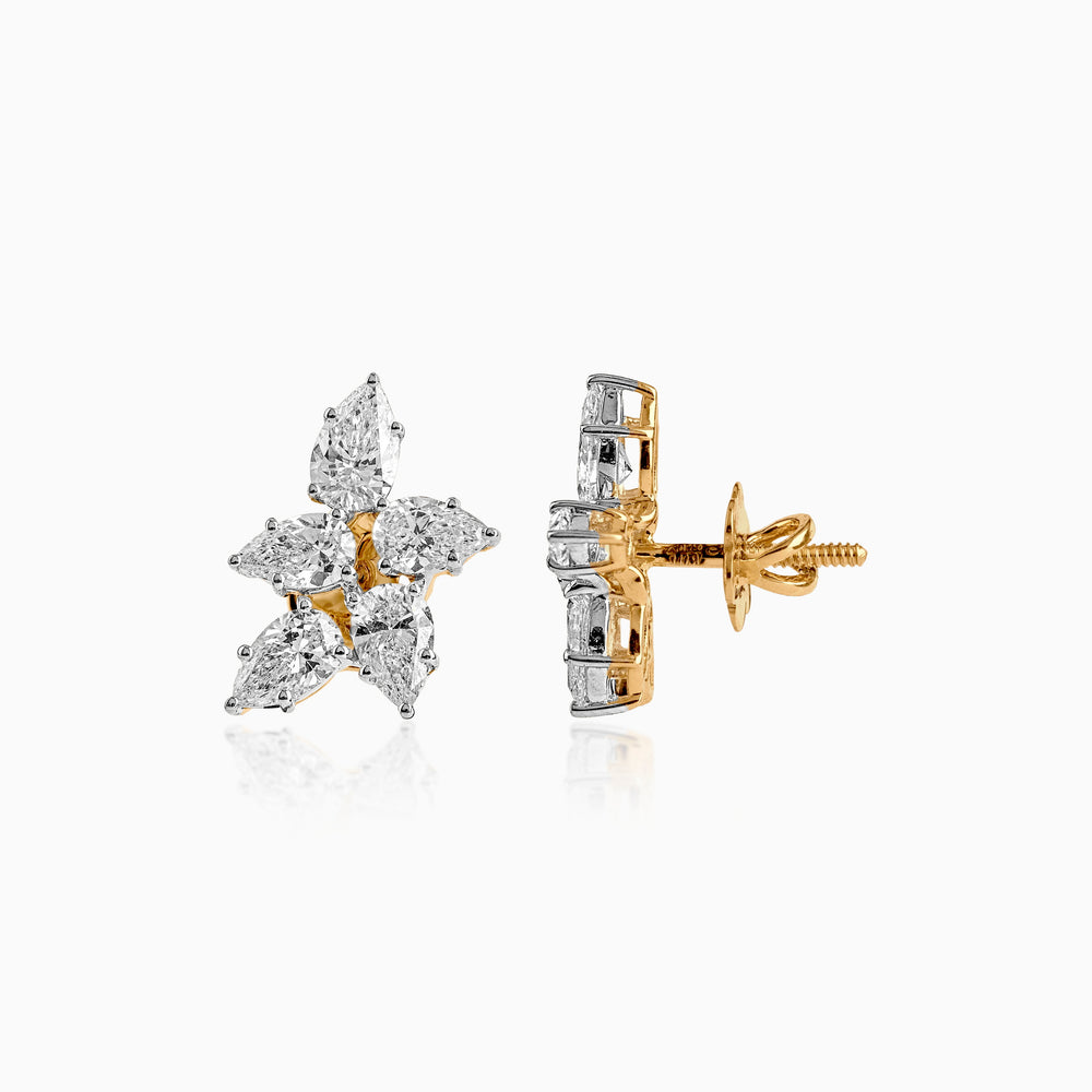 Gold and white diamond cluster stud earrings with intricate multi-stone design
