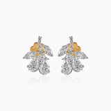 Diamond cluster earrings with gold and silver pear-shaped stones in elegant floral design