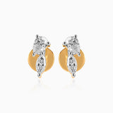 Gold and silver diamond stud earrings with multiple cut stones and curved design